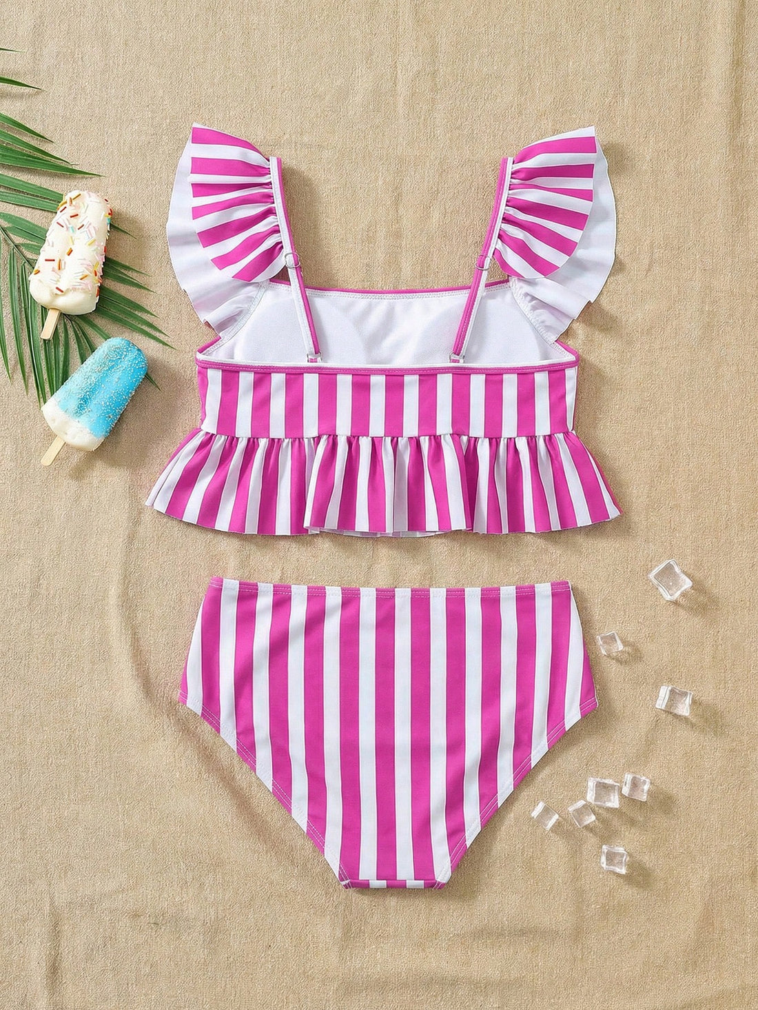 Girls striped tankini swimwear set with ruffle detail, square neckline, wireless top, and high-waist lined bottoms for beach and vacation wear.