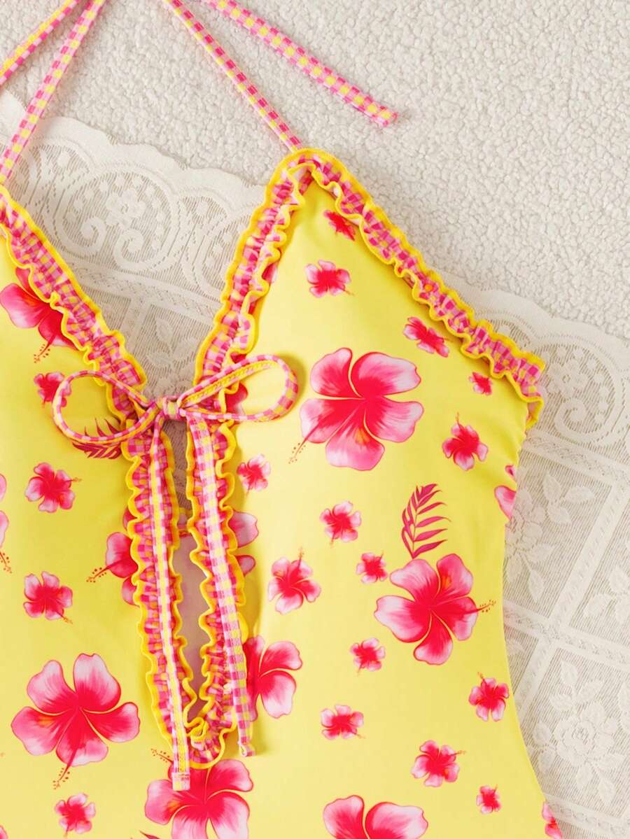 Multicolor floral print women's bikini swimsuit set featuring spaghetti straps, wireless lined bra with removable padding, backless lace-up design, and high cut bottom.