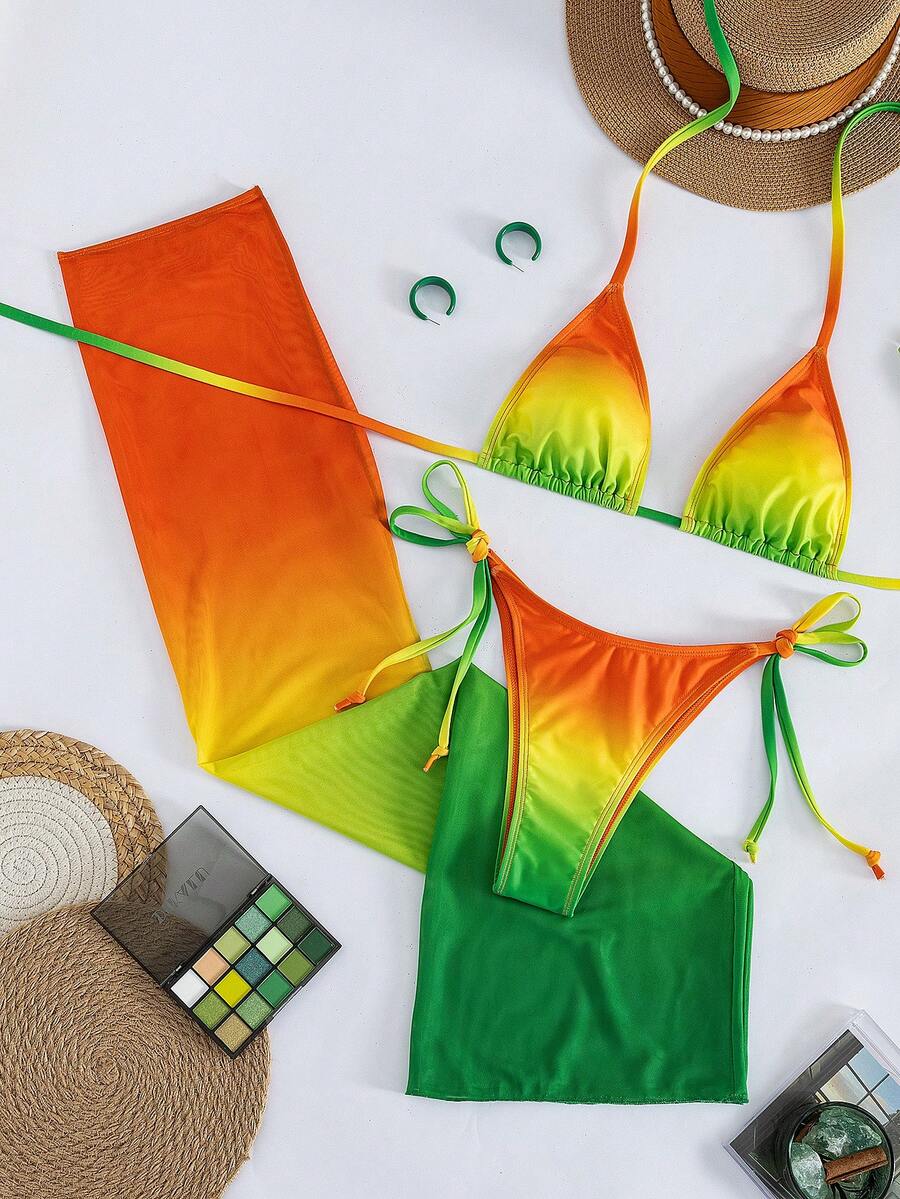Women's 3-piece gradient bikini set featuring a green halter tie top with removable padding, low waist bottoms, and a matching sheer mesh skirt.