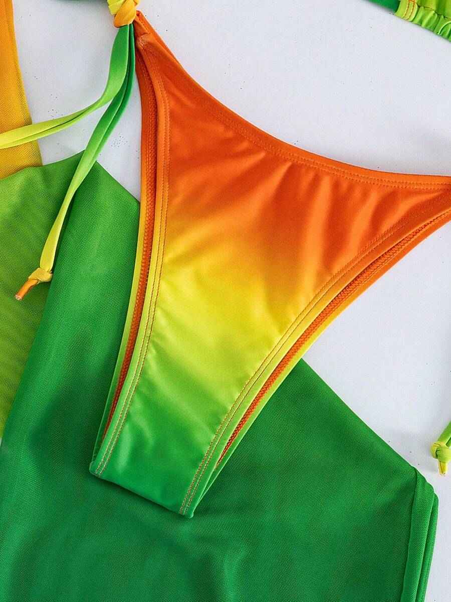 Women's 3-piece gradient bikini set featuring a green halter tie top with removable padding, low waist bottoms, and a matching sheer mesh skirt.