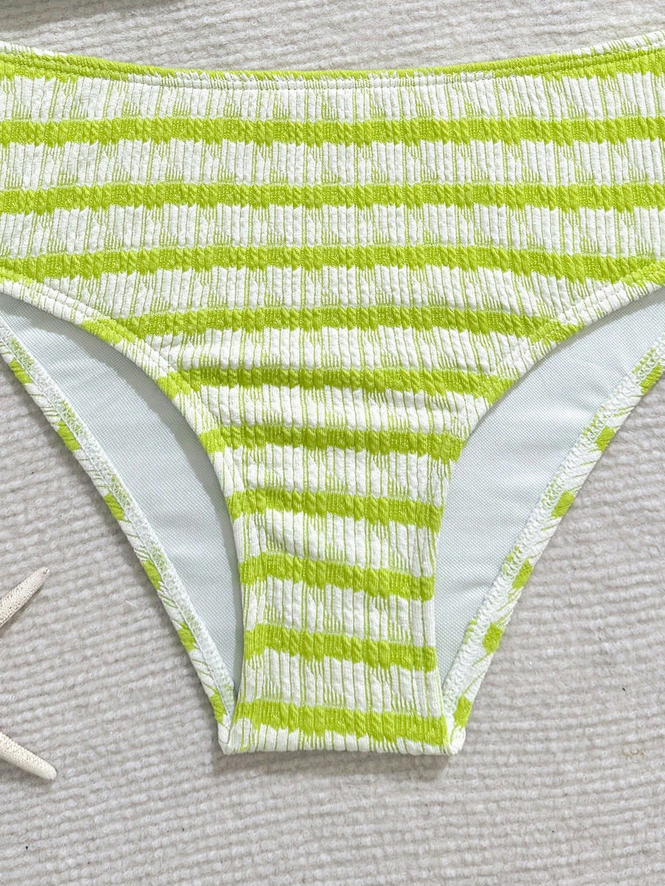 Tween girls blue and white striped two-piece bikini set with halter triangle top and mid-waist short bikini bottoms for beach and vacation swimwear.