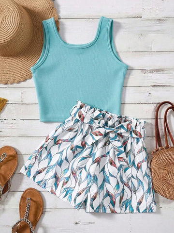 Tween girls 2-piece summer set featuring a turquoise blue ribbed tank top and tropical leaf pattern belted shorts.
