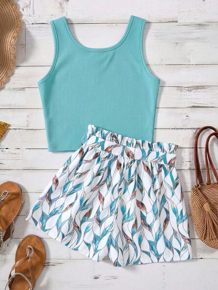 Tween girls 2-piece summer set featuring a turquoise blue ribbed tank top and tropical leaf pattern belted shorts.
