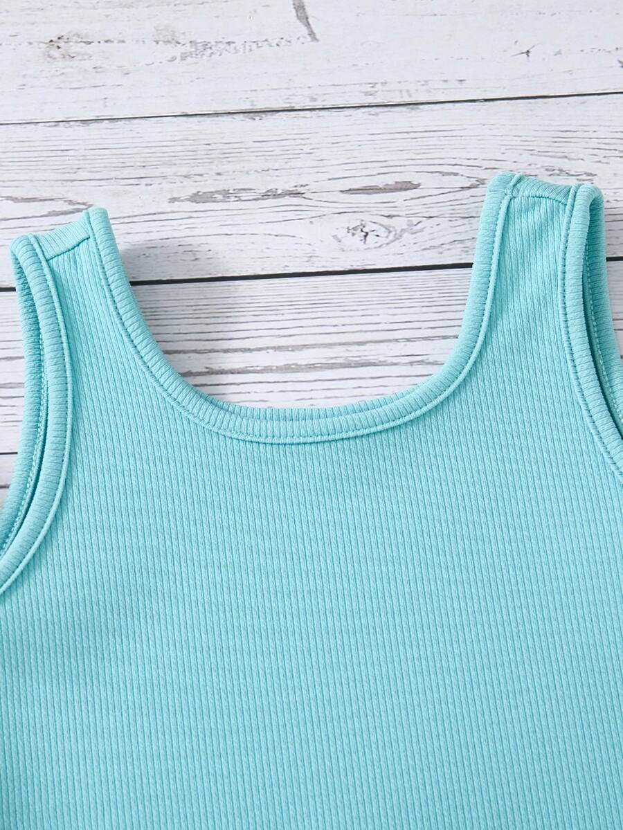 Tween girls 2-piece summer set featuring a turquoise blue ribbed tank top and tropical leaf pattern belted shorts.