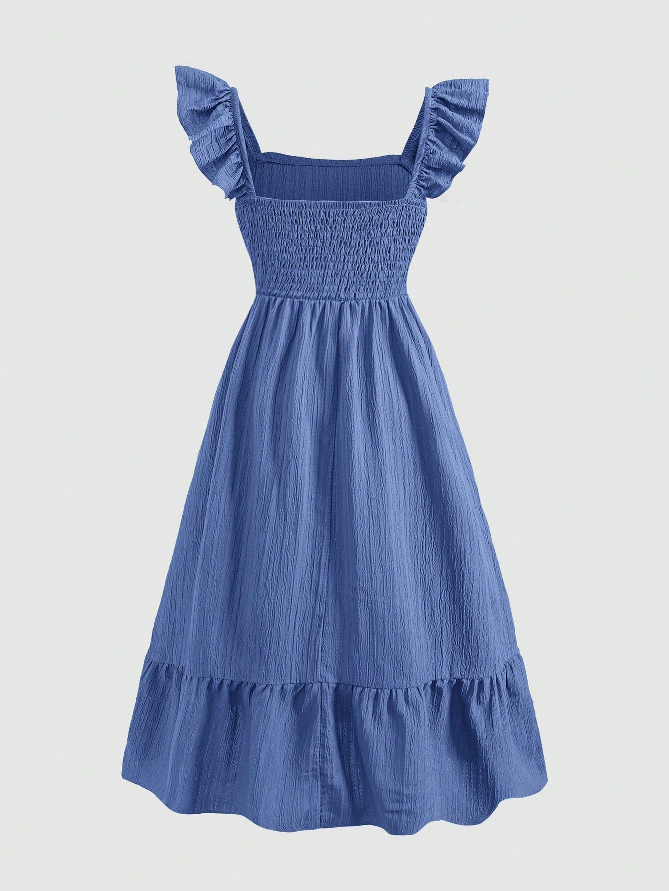 Tween girl multicolor floral vacation dress with square neck, ruffle details, shirred bodice, sleeveless A-line shape, high waist, and flounce hem.