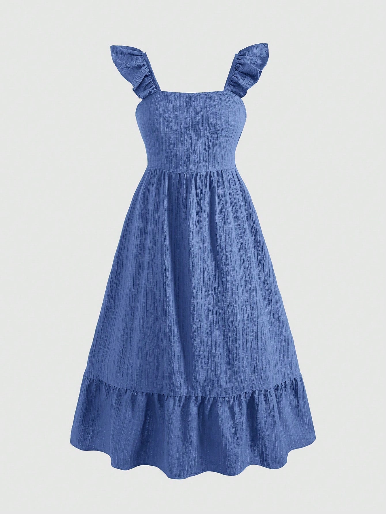 Tween girl multicolor floral vacation dress with square neck, ruffle details, shirred bodice, sleeveless A-line shape, high waist, and flounce hem.