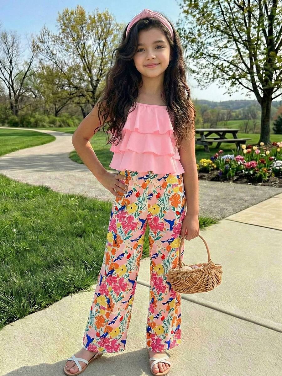 Tween girls blue 2-piece vacation outfit set featuring a tiered ruffle spaghetti strap camisole and loose high-waist pants.