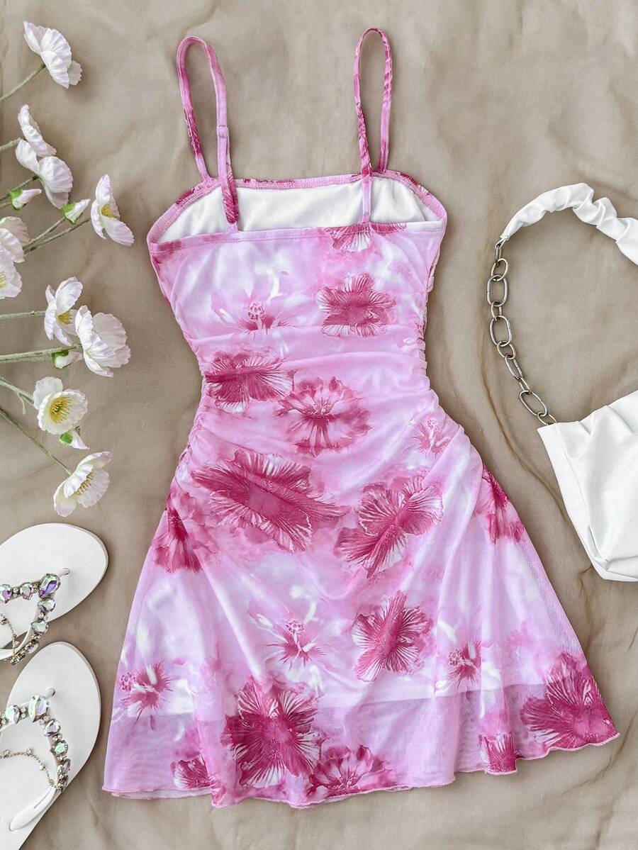 Yellow sleeveless tween girls cami dress with spaghetti straps, ruched bust, shirred details, high waist, and flared short A-line hem for vacation wear.