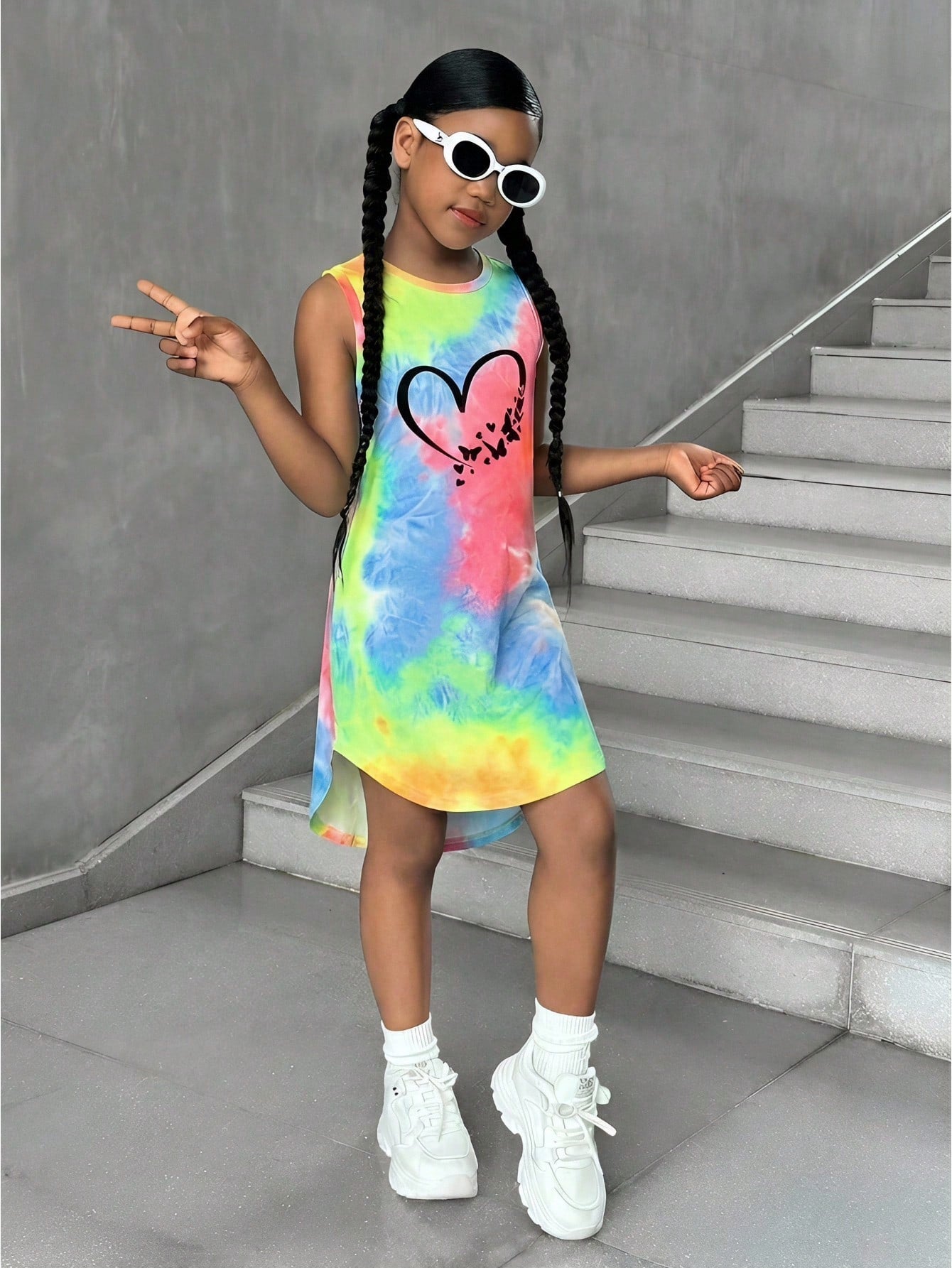 Tween girls sleeveless tie-dye tank dress with round neck, loose fit, short length, and asymmetrical hem in a casual streetwear style