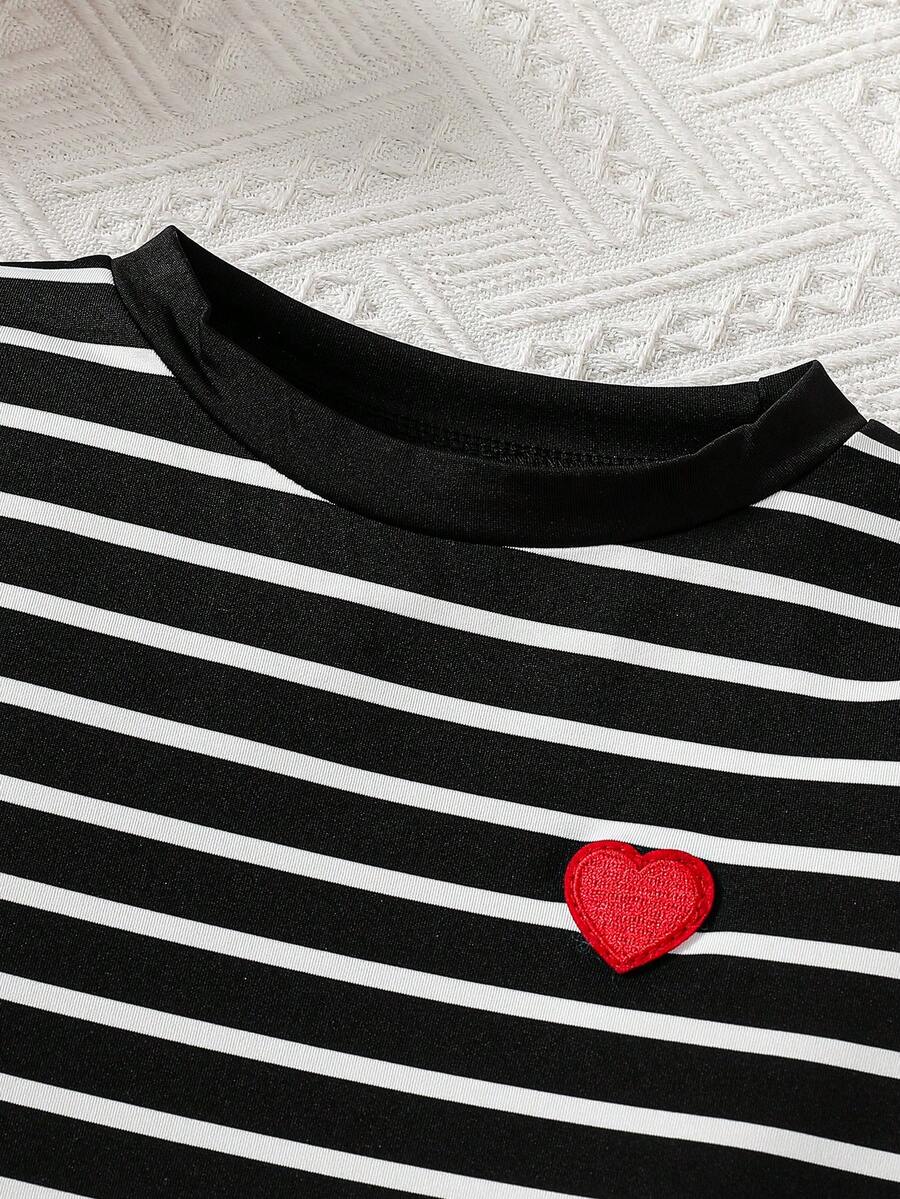 Girls black striped midi dress featuring short sleeves, round neck, slim fit, and flared hem.
