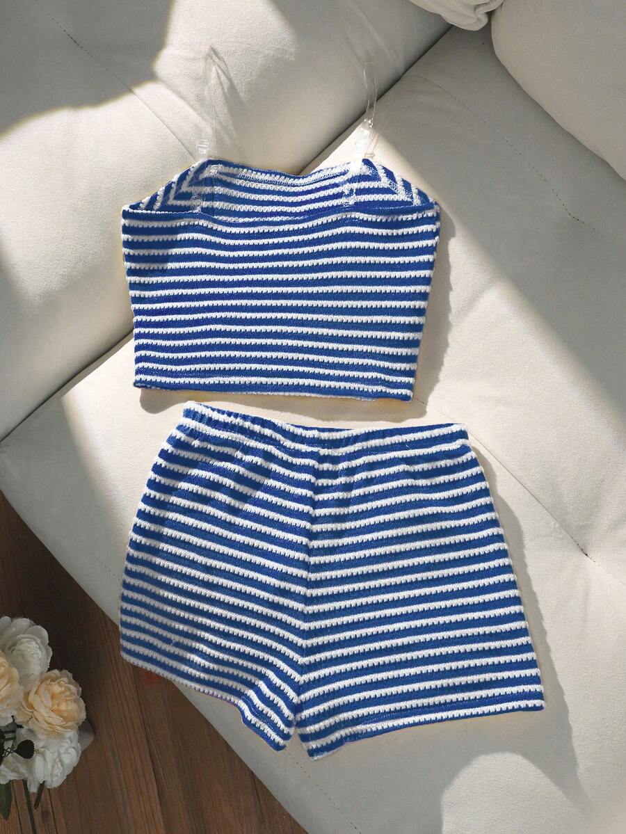 Tween girls black and white striped two-piece set featuring a spaghetti strap micro crop tank top with lettuce trim and ruffle hem paired with matching slim fit shorts.