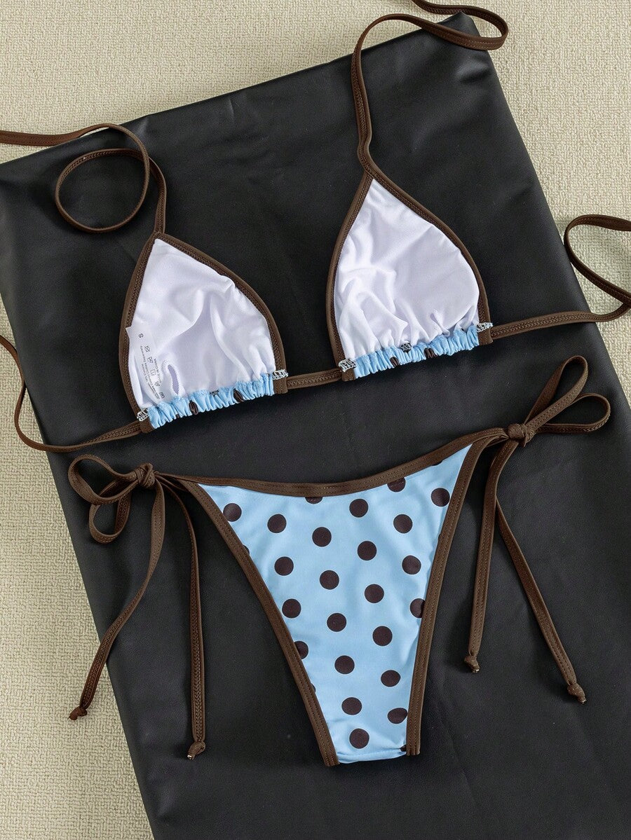 Women's two-piece halter triangle bikini set featuring a backless tie-back top with removable padding and matching tie-side mid-waist bottoms.