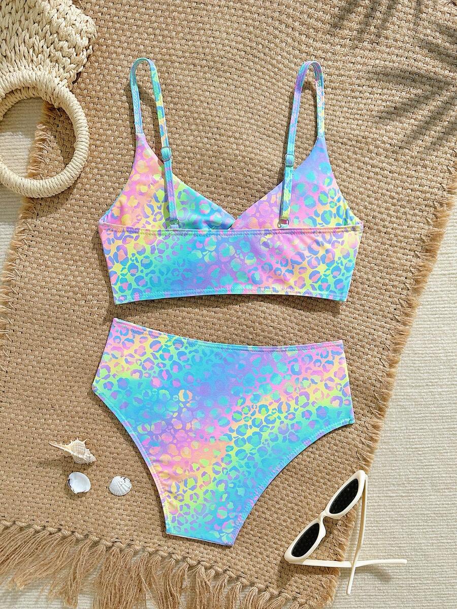 Tween girls multicolor striped 2-piece bikini set with spaghetti strap top, twist detail, and short high-waist or mid-waist swim bottoms for beach and pool wear.