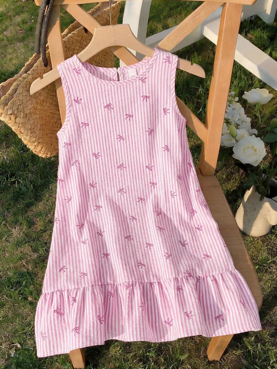 Tween girls casual leopard print smock mini dress featuring a round neck and flounce ruffle hem.
