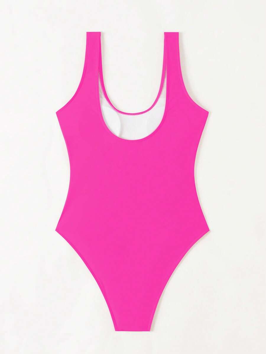Women's solid color one-piece swimsuit featuring a backless scoop neck design and high cut fit