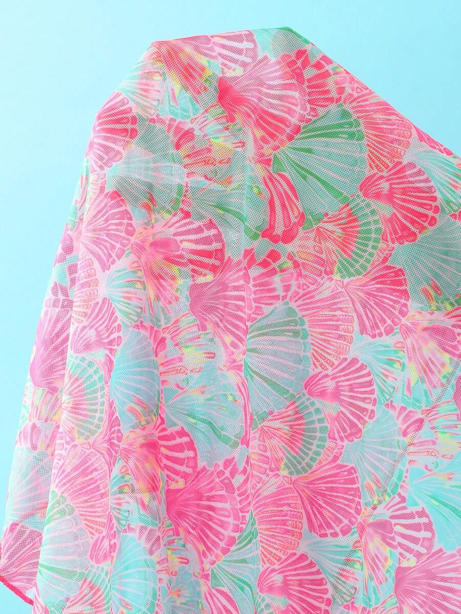 Women's 3-piece blue tropical shell print bikini set featuring a halter bralette top, low-waist tie-side bottom, and a matching sheer mesh cover-up skirt.