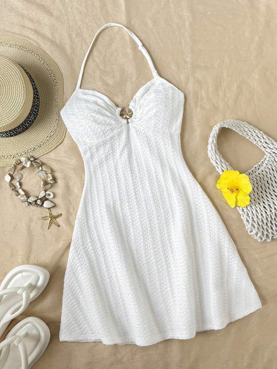 Tween girls blue sleeveless cami dress with spaghetti straps, ruched bust, short slim fit, and vacation-ready style