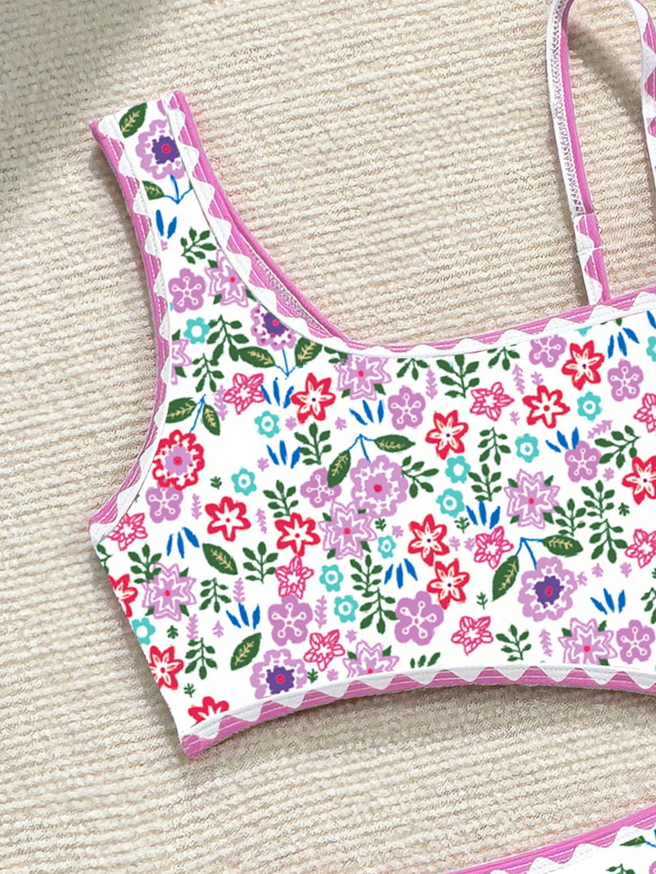 Tween girl one-piece swimsuit with floral plant print, asymmetrical neckline, cut-out detail, and fitted high-stretch design for beach and pool wear