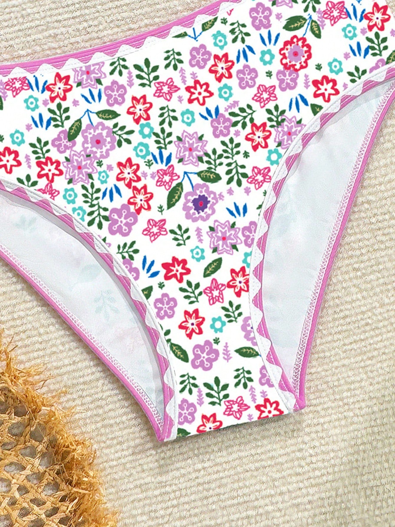 Tween girl one-piece swimsuit with floral plant print, asymmetrical neckline, cut-out detail, and fitted high-stretch design for beach and pool wear