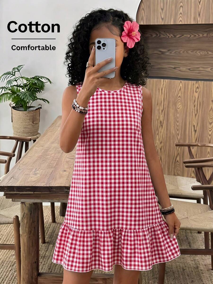 Tween girls casual leopard print smock mini dress featuring a round neck and flounce ruffle hem.