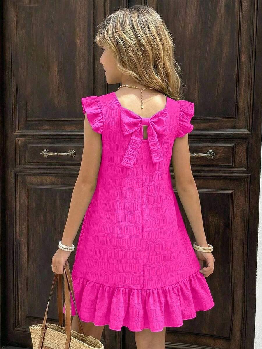 Tween girls apricot vacation midi dress featuring a round neck, cut out details, ruffle flounce accents, and geometric pattern.