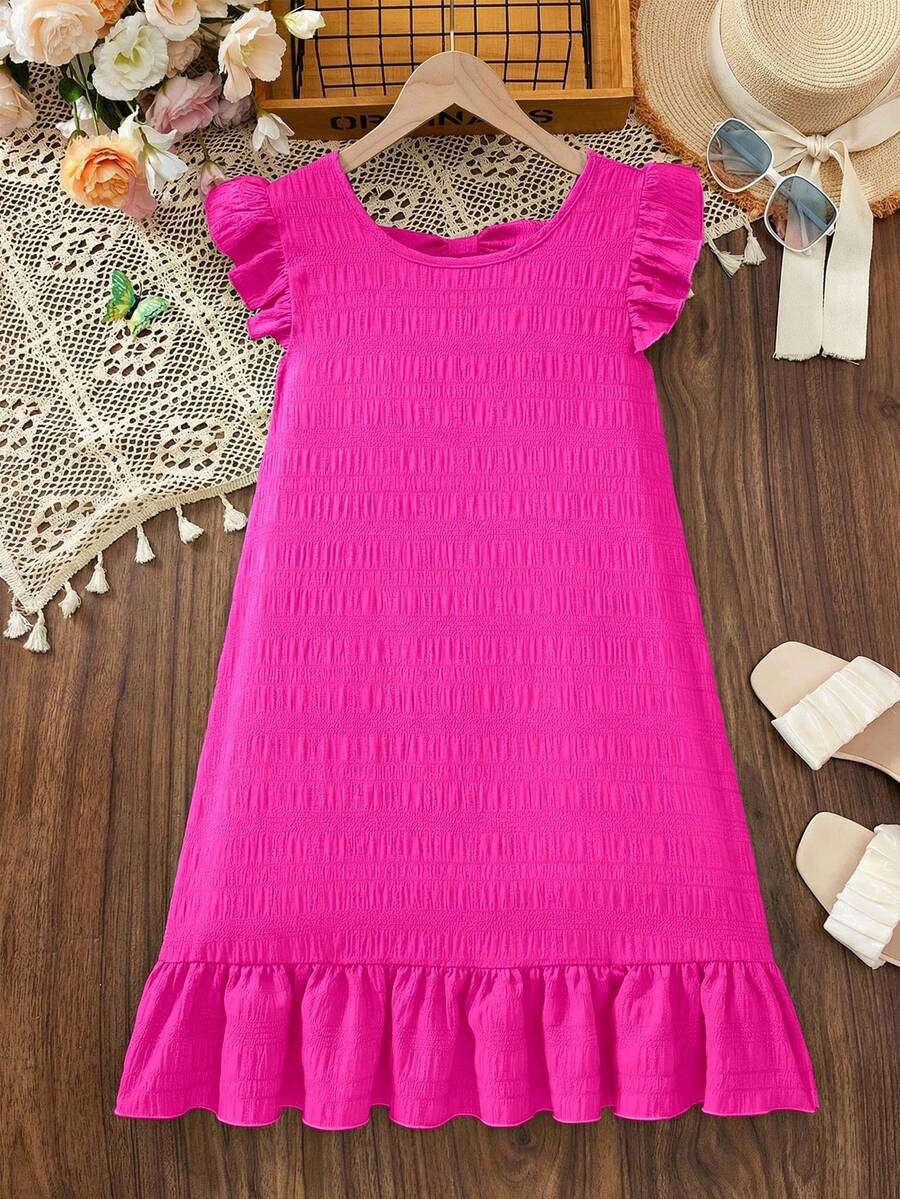 Tween girls apricot vacation midi dress featuring a round neck, cut out details, ruffle flounce accents, and geometric pattern.