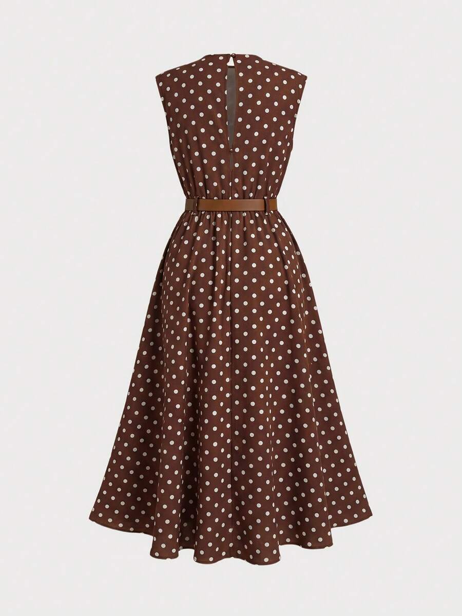 Tween girl wearing an apricot plant print long dress featuring a stand collar, short sleeves, high waist, flared hem, and back zipper closure.