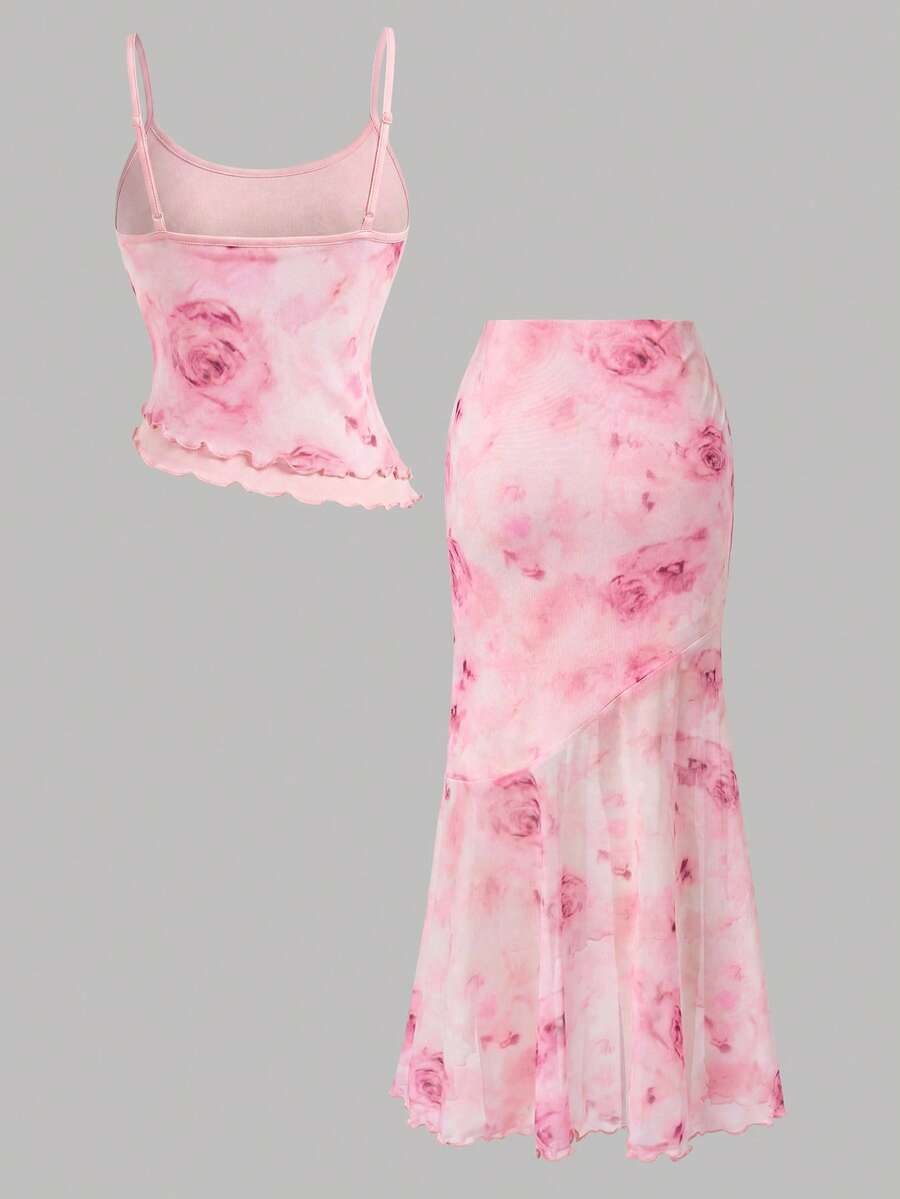 Tween girls blue 2-piece set featuring a short spaghetti strap lace tank top with asymmetrical lettuce trim and a long matching skirt.