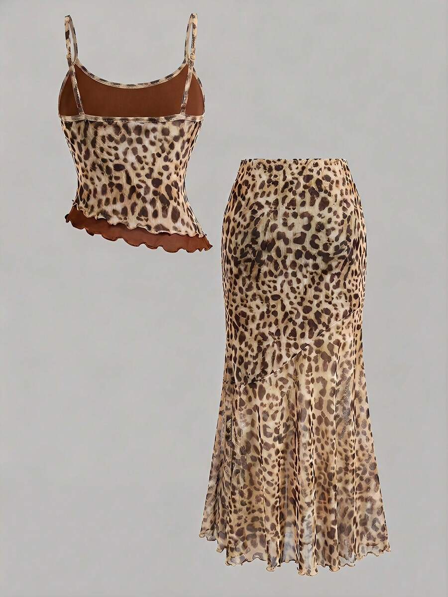Tween girls blue 2-piece set featuring a short spaghetti strap lace tank top with asymmetrical lettuce trim and a long matching skirt.