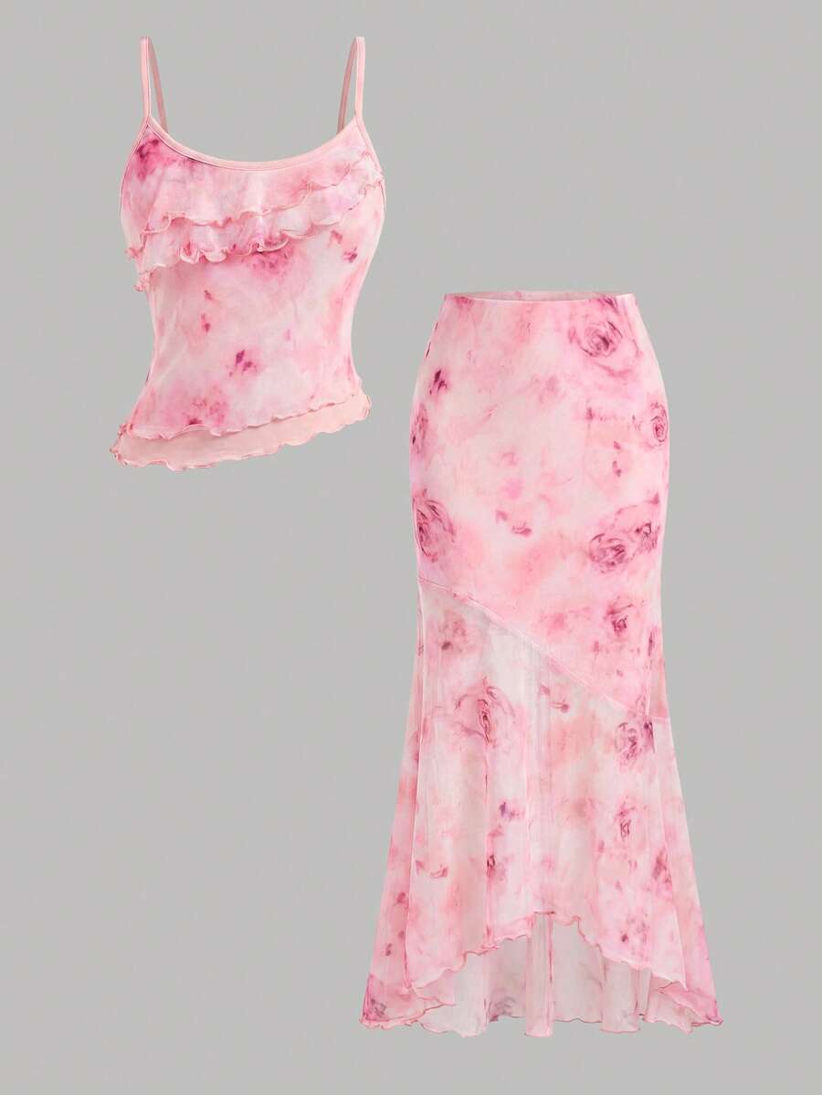 Tween girls blue 2-piece set featuring a short spaghetti strap lace tank top with asymmetrical lettuce trim and a long matching skirt.