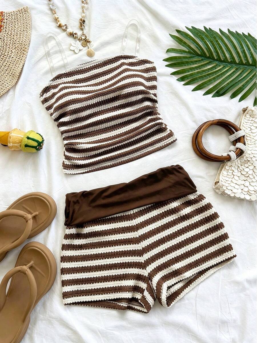 Tween girls black and white striped two-piece set featuring a spaghetti strap micro crop tank top with lettuce trim and ruffle hem paired with matching slim fit shorts.