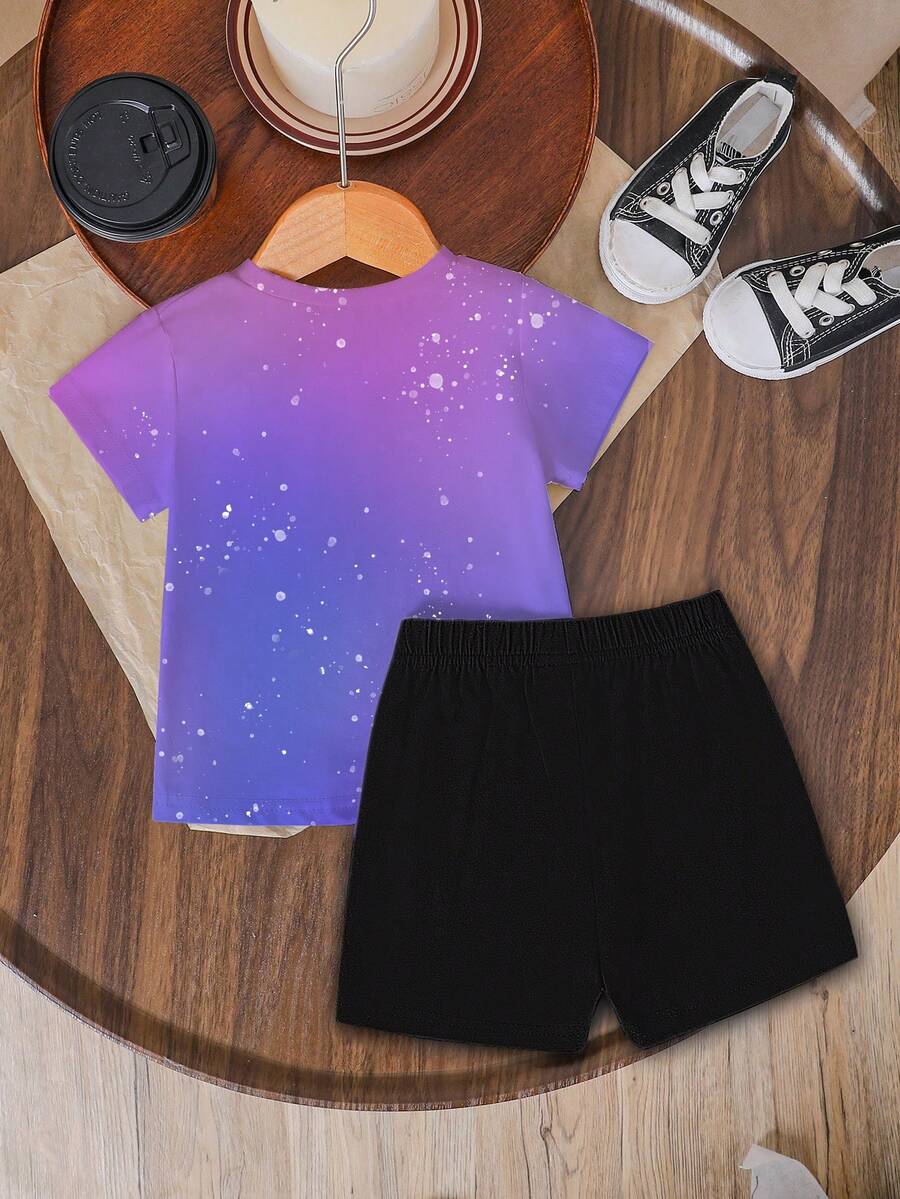 Tween girls two-piece green summer outfit featuring a fruit print short sleeve round neck t-shirt and matching track shorts with pockets.