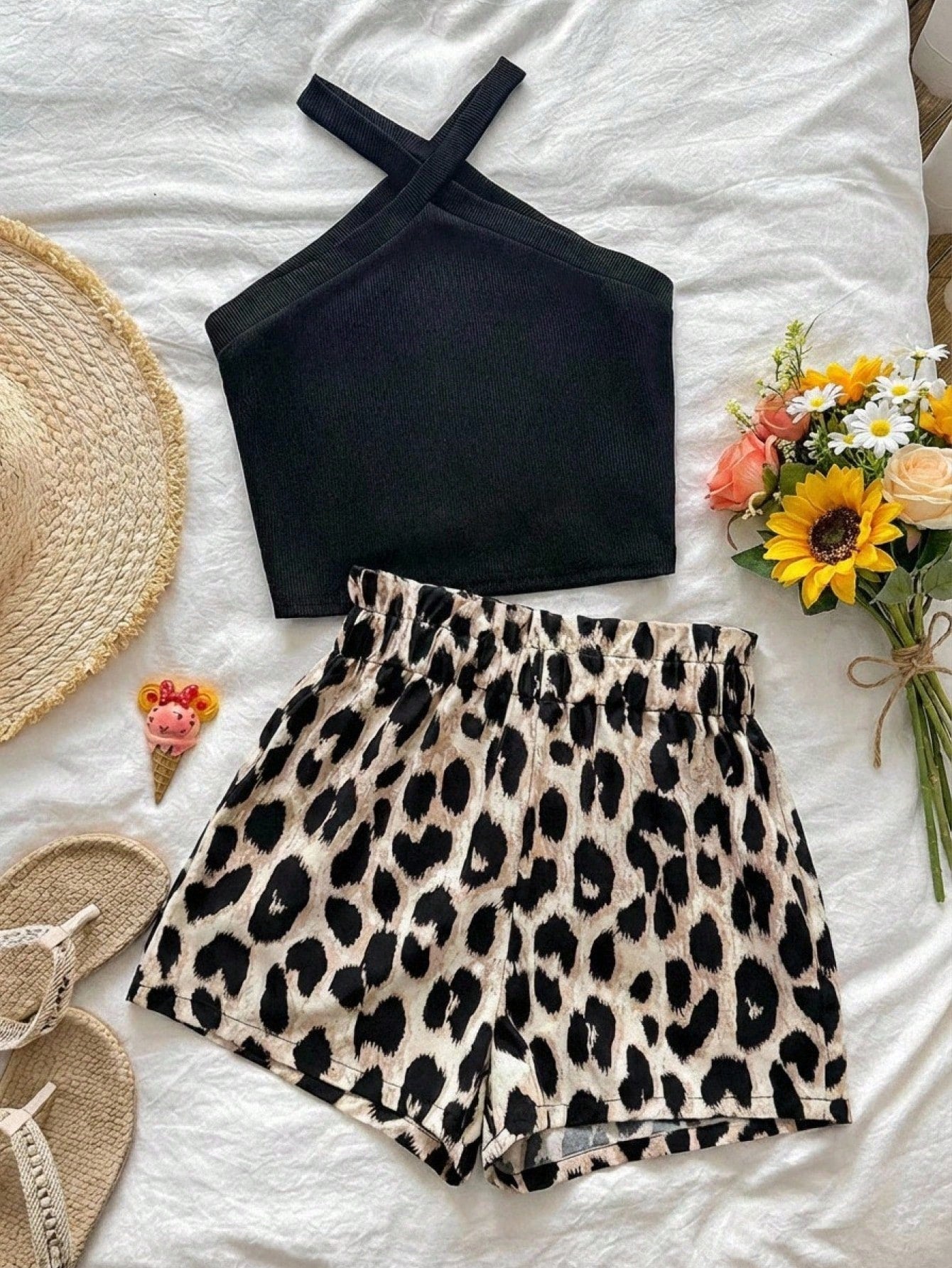 Tween girl 2-piece casual outfit set featuring a solid beige knit halter sleeveless top with belted detail and matching shorts.