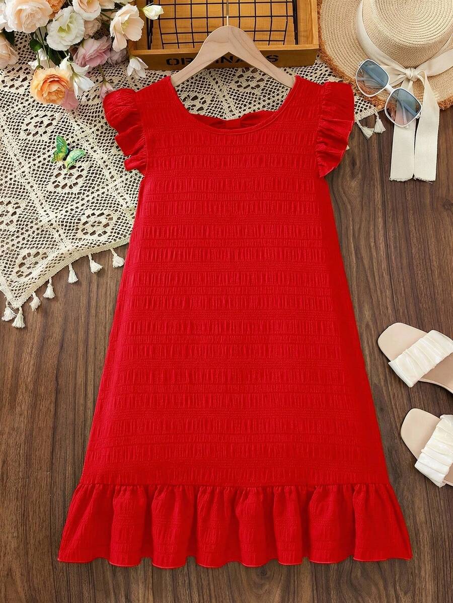 Tween girls apricot vacation midi dress featuring a round neck, cut out details, ruffle flounce accents, and geometric pattern.