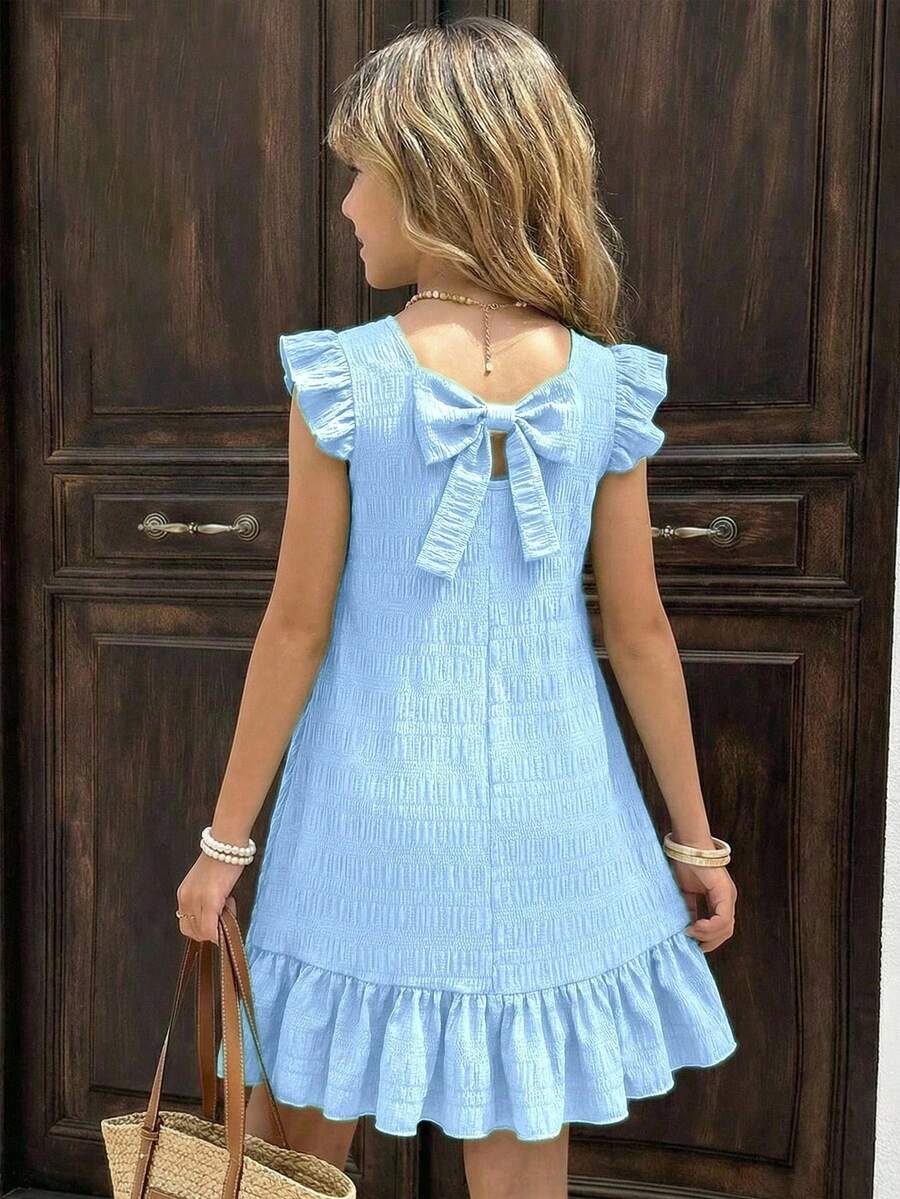 Tween girls apricot vacation midi dress featuring a round neck, cut out details, ruffle flounce accents, and geometric pattern.