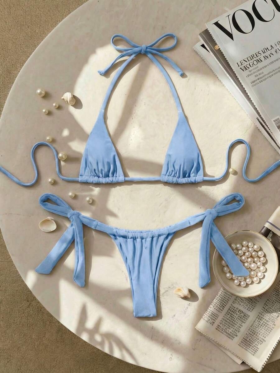 Army green high waist micro bikini swimsuit set for women featuring wireless spaghetti strap top with chain knot details and tie side thong bottoms.