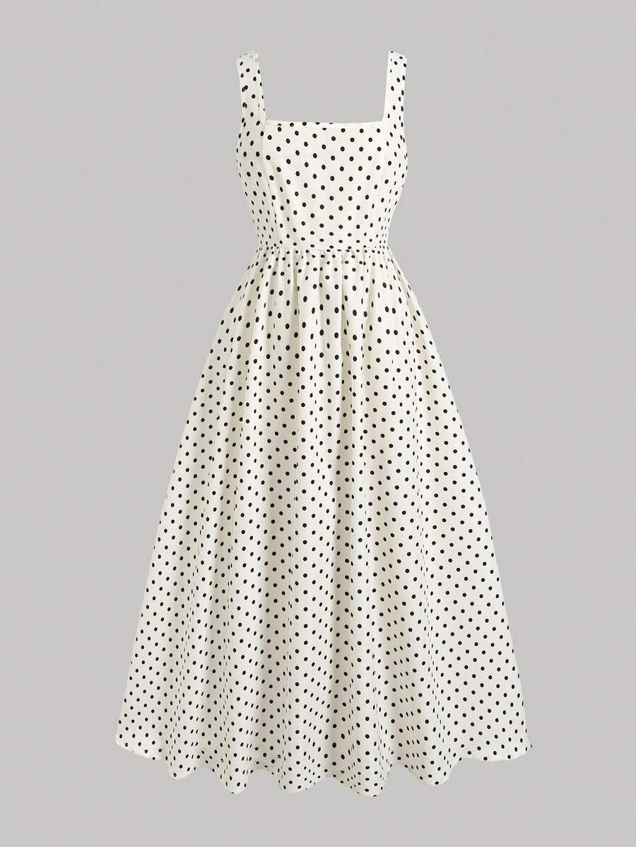 Tween girls apricot polka dot long cami dress with shoulder straps, high waist, and flared A-line skirt.