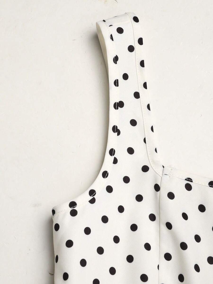 Tween girls apricot polka dot long cami dress with shoulder straps, high waist, and flared A-line skirt.