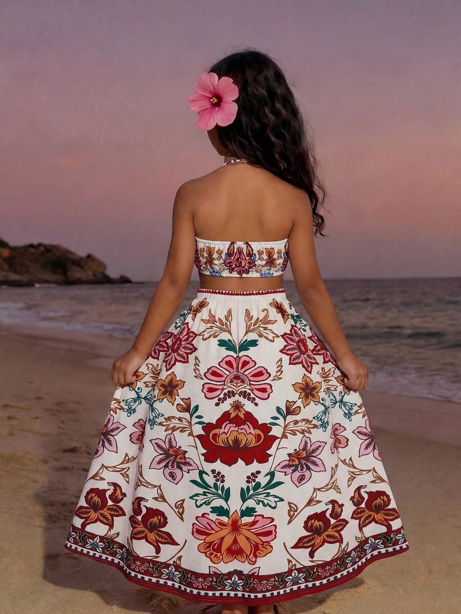 Tween girls floral halter dress with backless sleeveless design, belted high waist, shirred details, appliques, and flared A-line midi silhouette for summer vacation or graduation outfit.