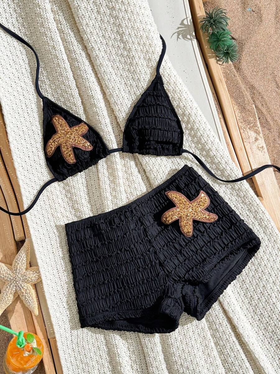 Women's apricot two-piece swimsuit set with a halter tie-back top and matching high stretch shorts.