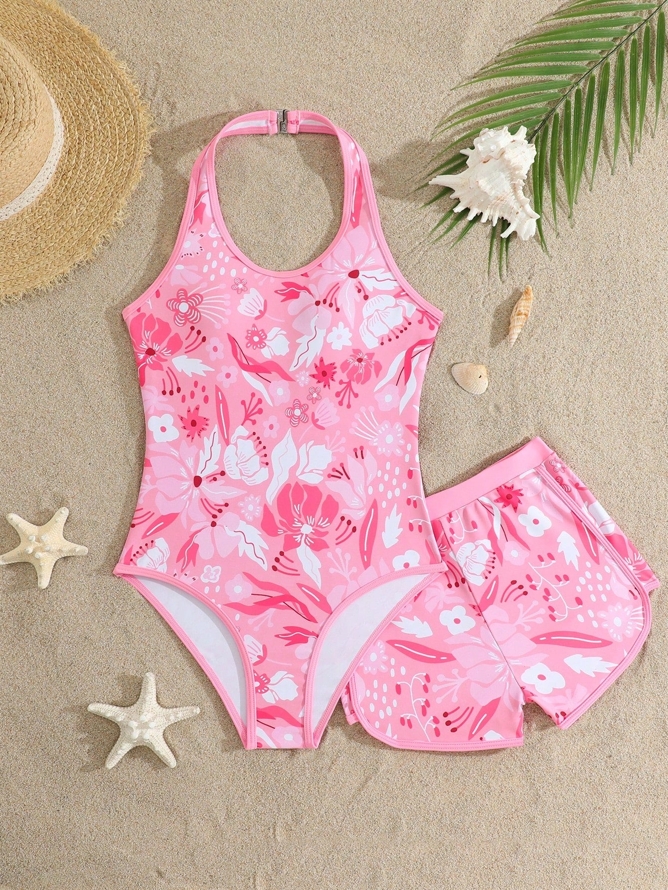 Girls 2-piece swimwear set featuring a butterfly print halter swimsuit top with contrast piping and separate mid-waist shorts; sleeveless, high-stretch, wireless design for beach and vacation wear.