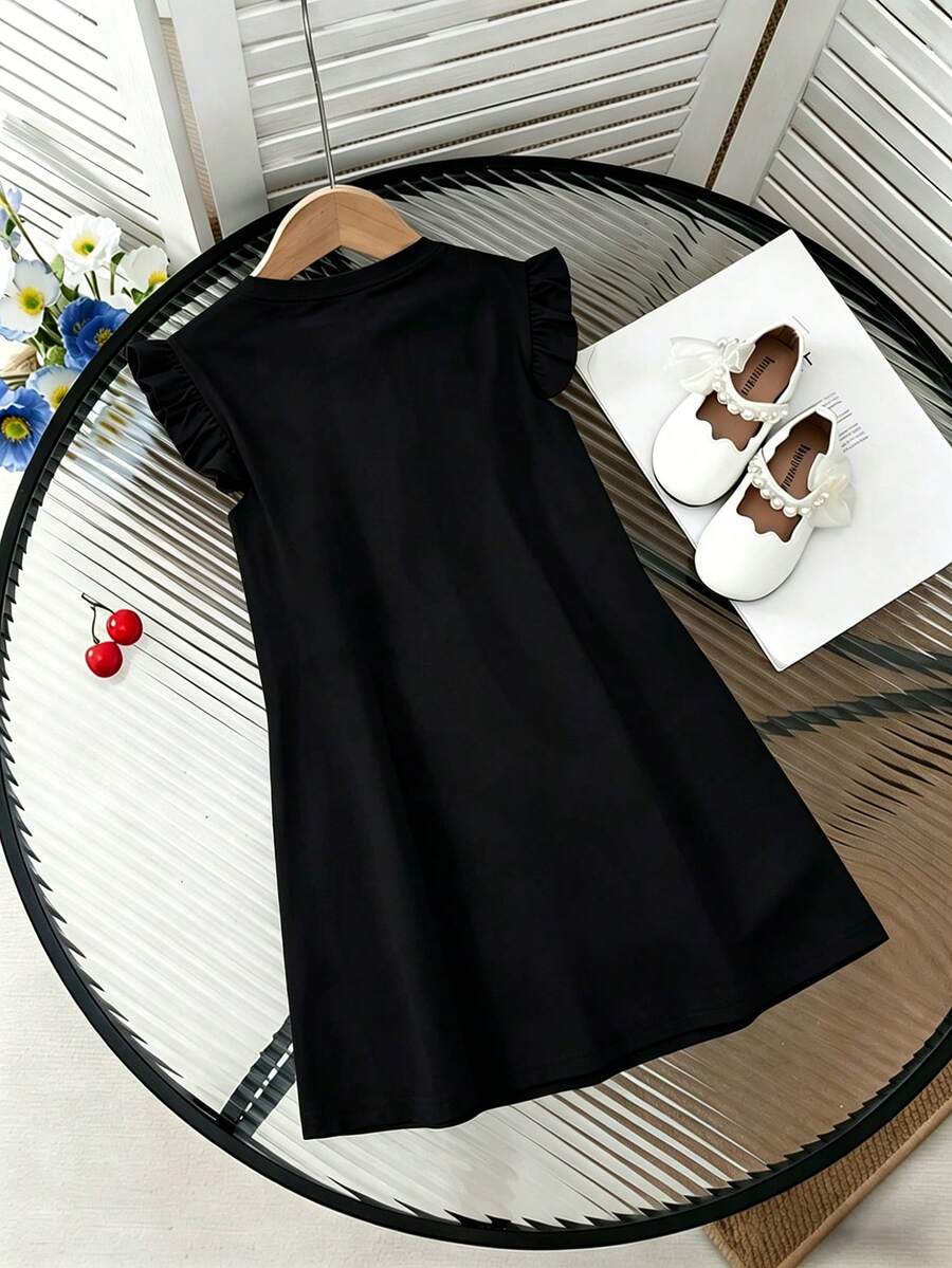 Girls black ruffle sleeve midi dress featuring a loose fit tunic silhouette, round neckline, button details, and short flounce sleeves.