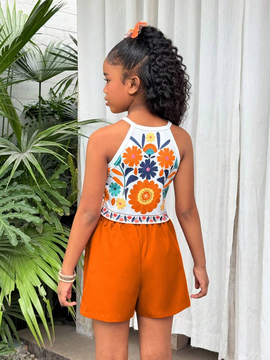 Girls 2-piece vacation outfit set with sleeveless halter knit crop top and graphic cargo shorts.