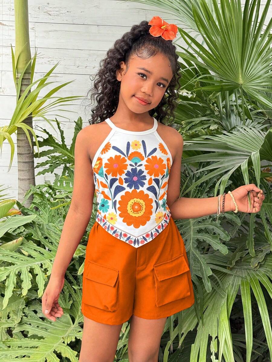 Girls 2-piece vacation outfit set with sleeveless halter knit crop top and graphic cargo shorts.