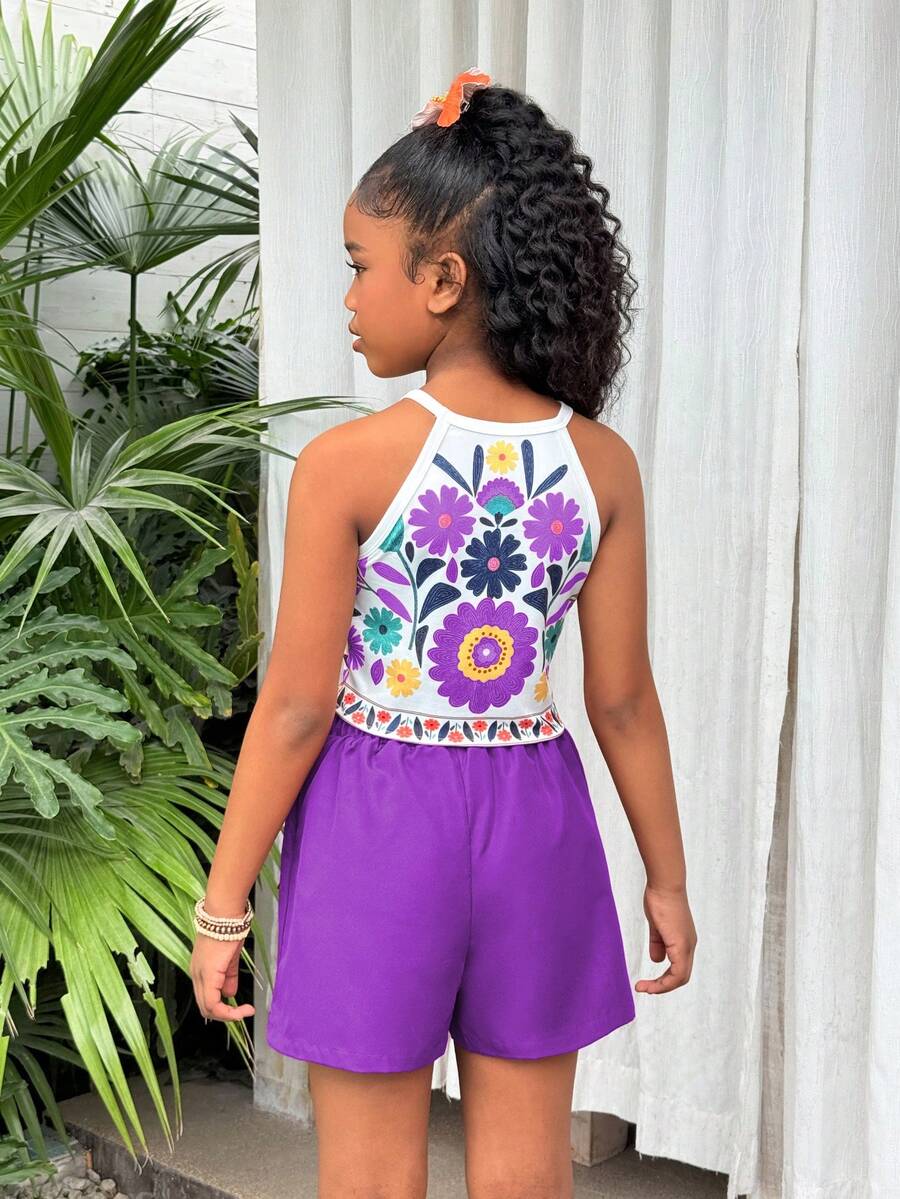 Girls 2-piece vacation outfit set with sleeveless halter knit crop top and graphic cargo shorts.