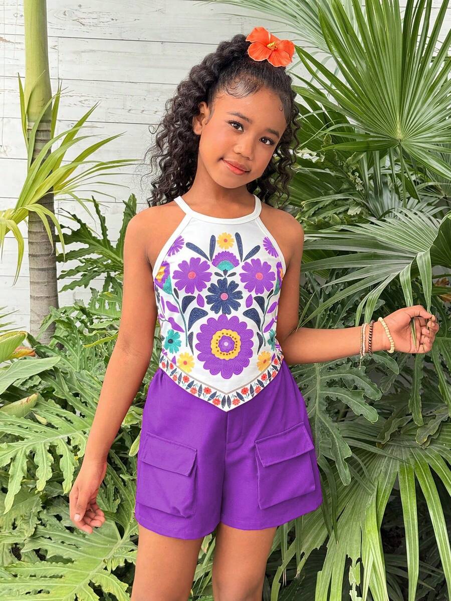 Girls 2-piece vacation outfit set with sleeveless halter knit crop top and graphic cargo shorts.
