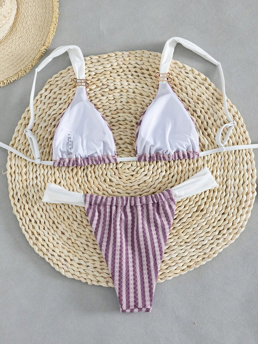 Multicolor colorblock bikini set for women featuring a wireless triangle bra top with shoulder straps and ring knot details paired with high waist high cut bottoms.
