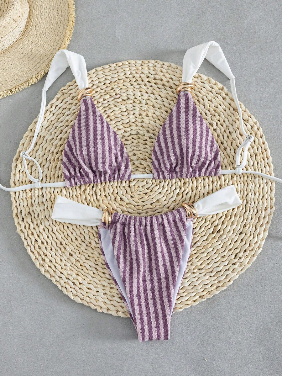 Multicolor colorblock bikini set for women featuring a wireless triangle bra top with shoulder straps and ring knot details paired with high waist high cut bottoms.