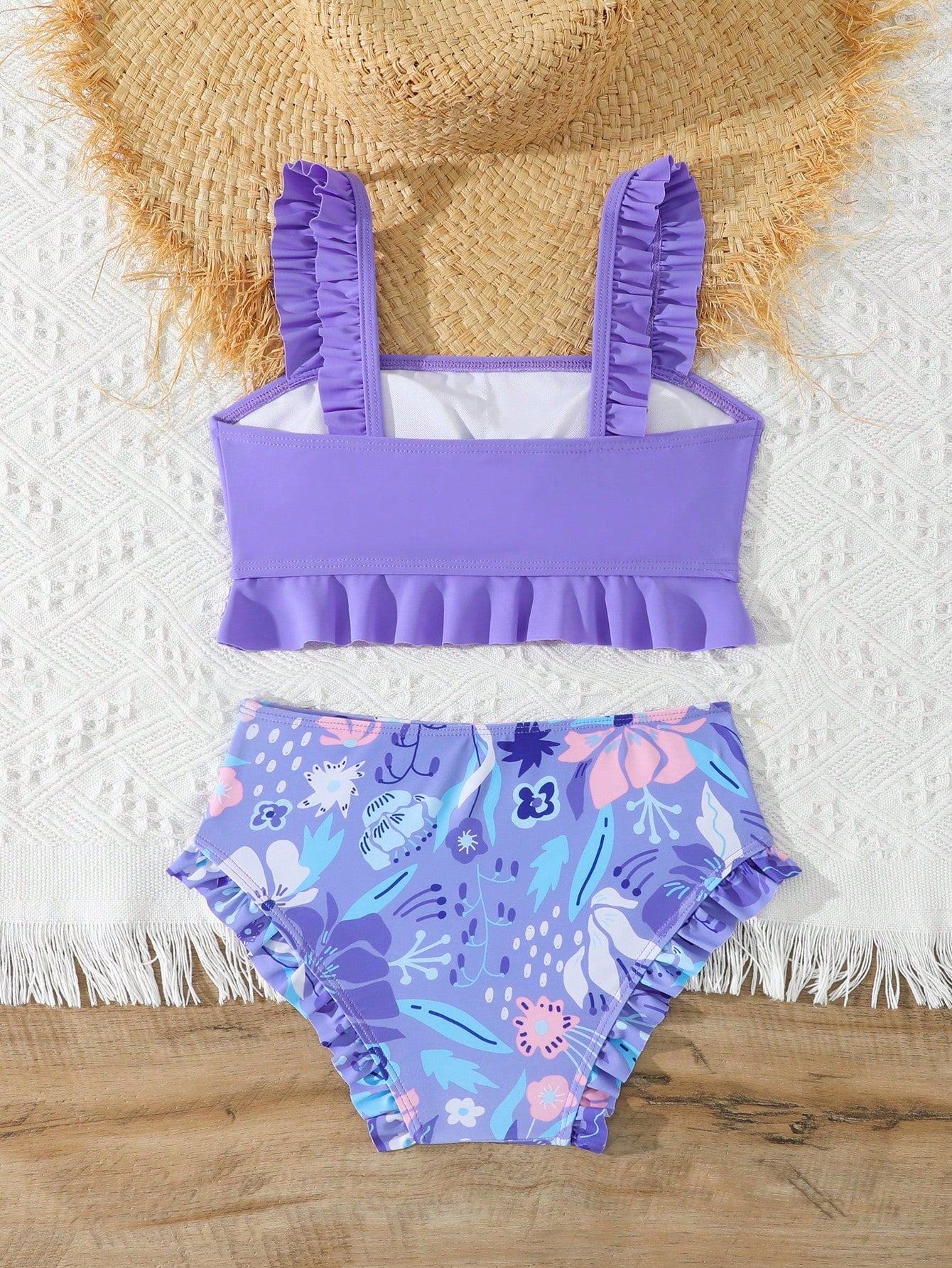 Tween girls solid color 2-piece bikini swimwear set with ruffle detail, strap neckline, wireless bikini top, and triangle mid-waist bikini bottoms; textured pattern with lined bottoms and high-stretch fabric, suitable for summer vacation.