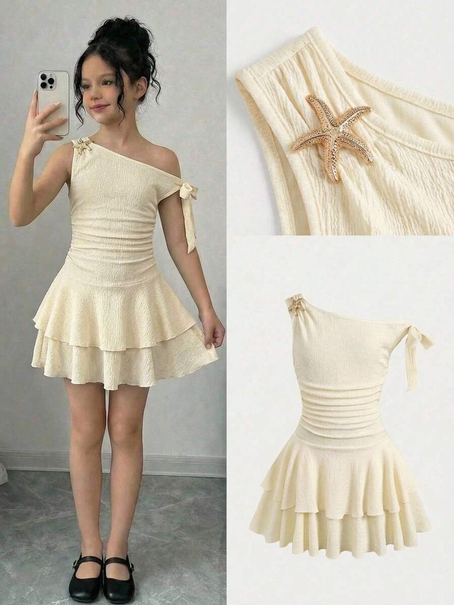 Apricot tiered asymmetrical ruffle dress for tween girls featuring short sleeves, layered hem, and slim fit A-line silhouette.